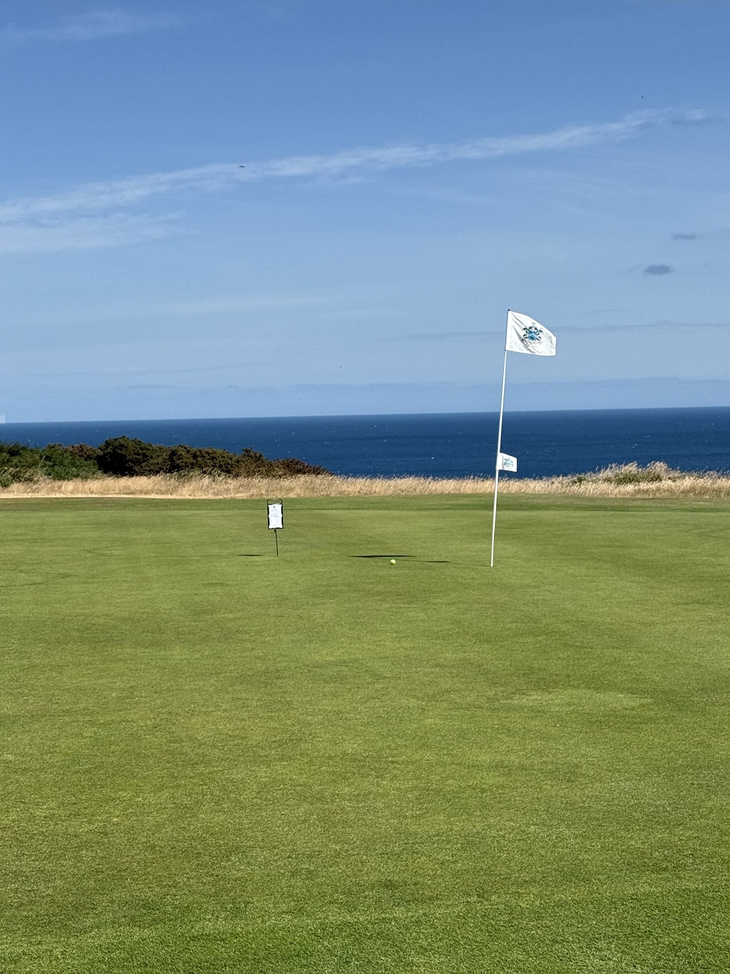 Royal Cromer — flagstick and North Sea