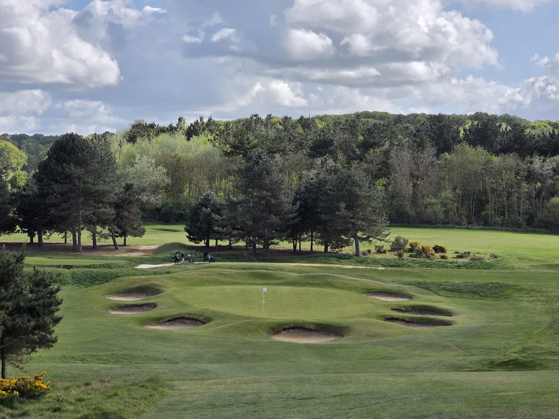 Royal Cromer — parkland holes, spring colour, golfers